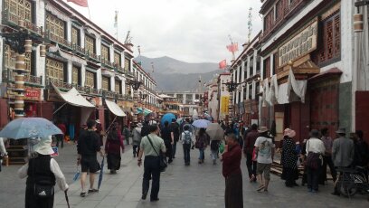 Things to do in Tibet. Busy Barkhor Street in Lhasa, capital of Tibet, where the people walk clockwise around a sacred temple