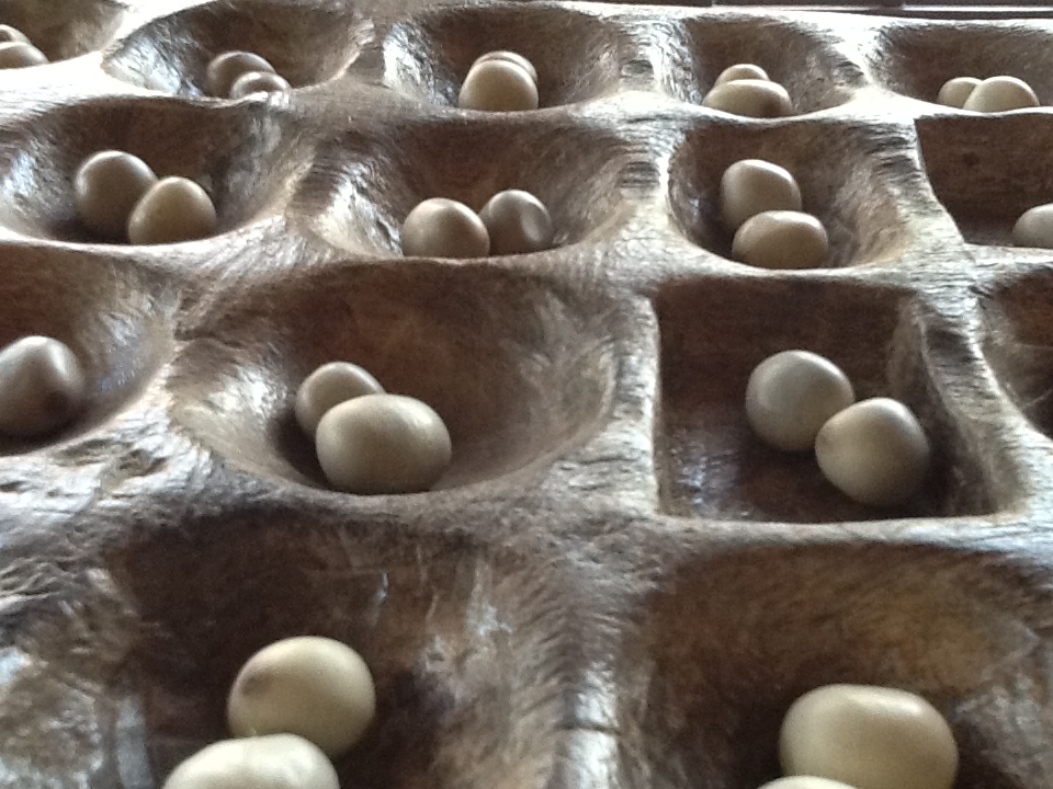 Mancala board game in Mozambique