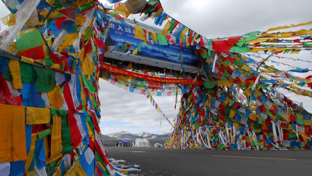 Tibetan prayer flags waving in the wind in Lhasa, Tibet.