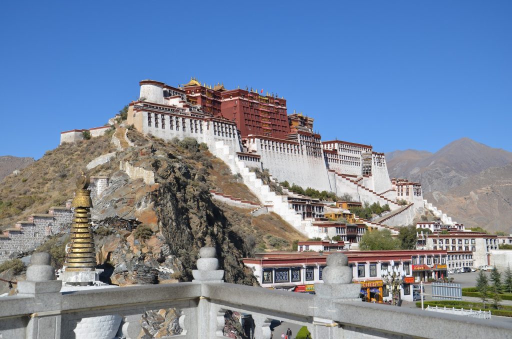 Multi day group tour in Lhasa, Tibet Potala Palace at the end of the journey to Tibet across central China