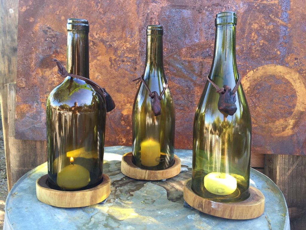 three empty wine bottles 