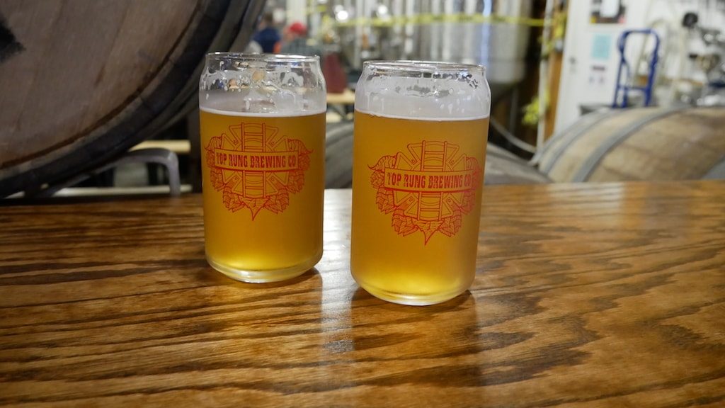 2 glasses of beer on a Brewery Road Trip