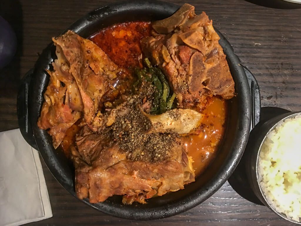 authentic ethnic restaurants in New York City offer goat stew