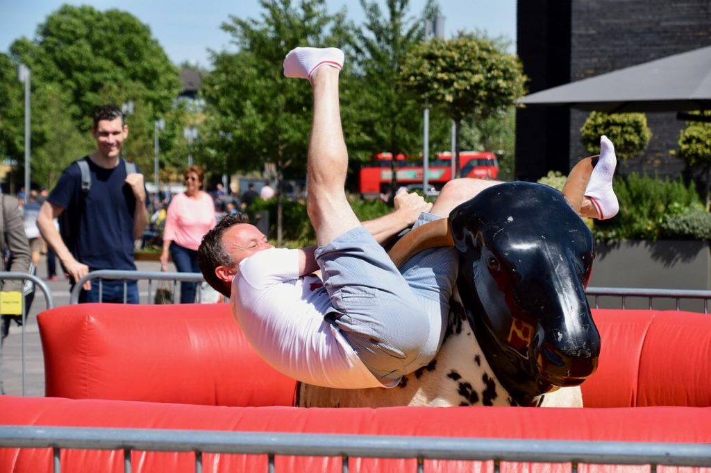 Falling off a mechanical bull is oinjury while traveling.