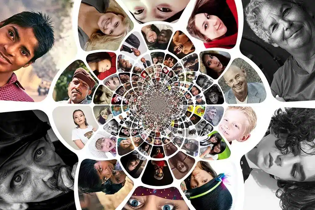 Different ethnic faces in a decorative swirl.