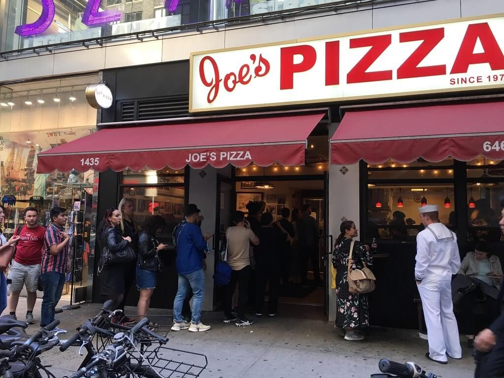 Joe's Pizza storefront. One of the famous places to eat in New York City