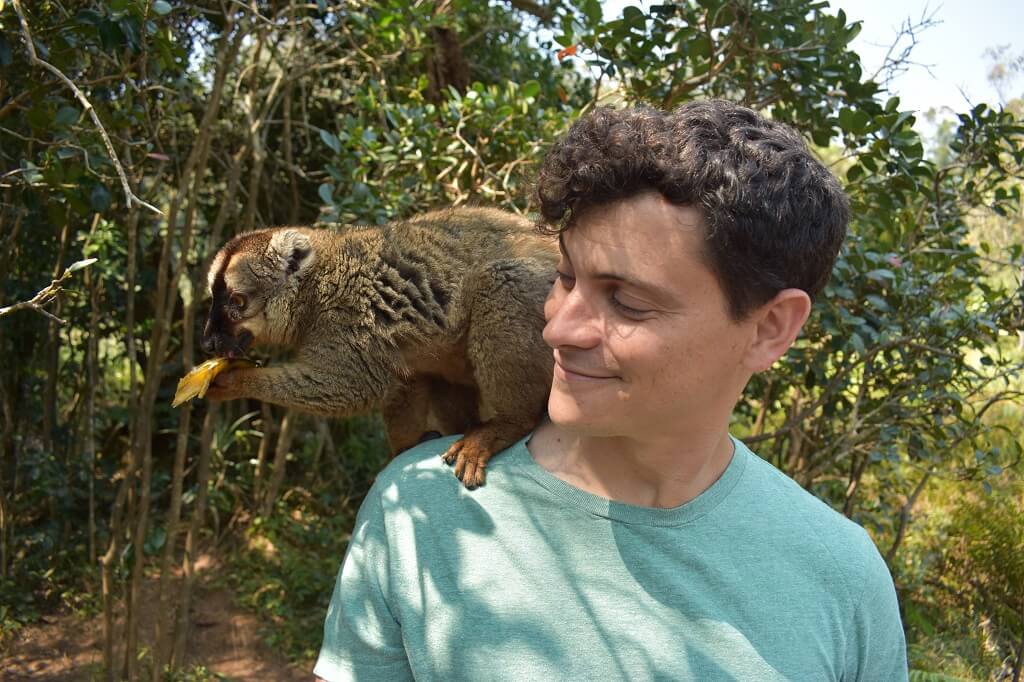 Nomadic Matt with pet, overcoming obstacles to travel