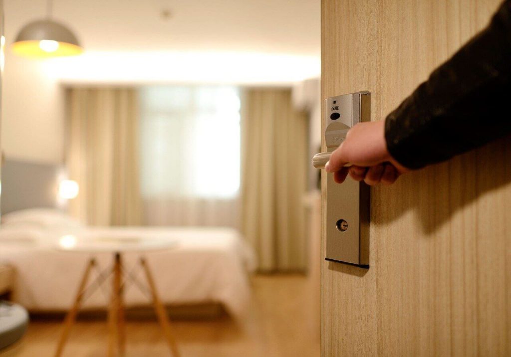 sanitize your hotel room on a road trip is one of the safe driving tips