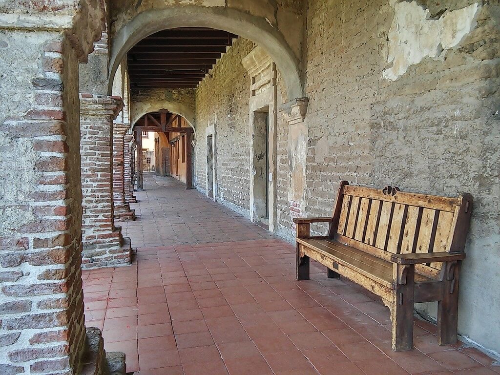 California mission walkway with bench