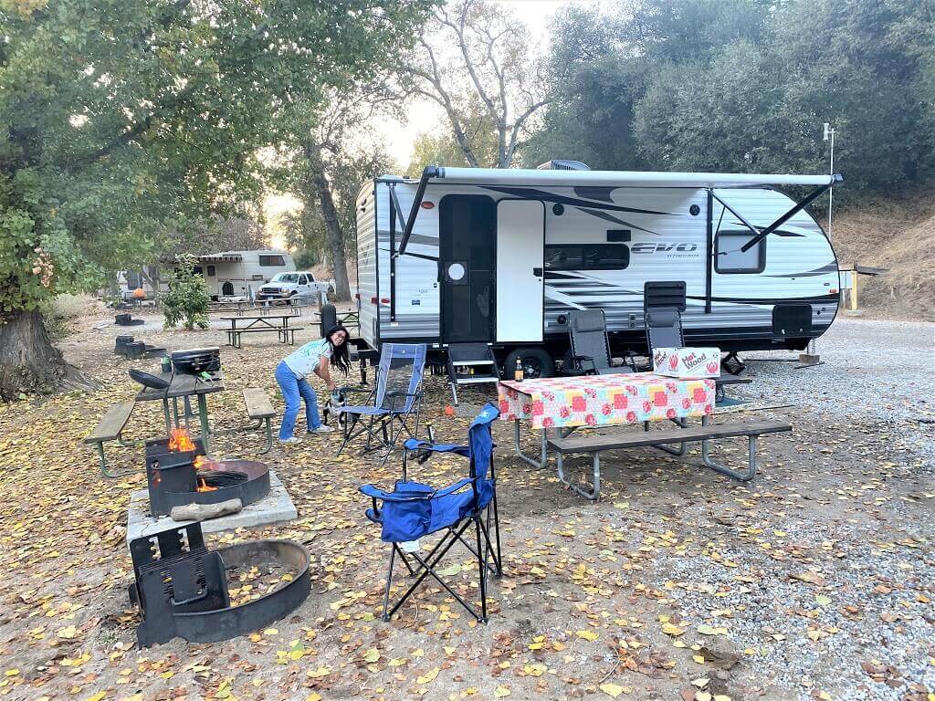 woman with RV camper