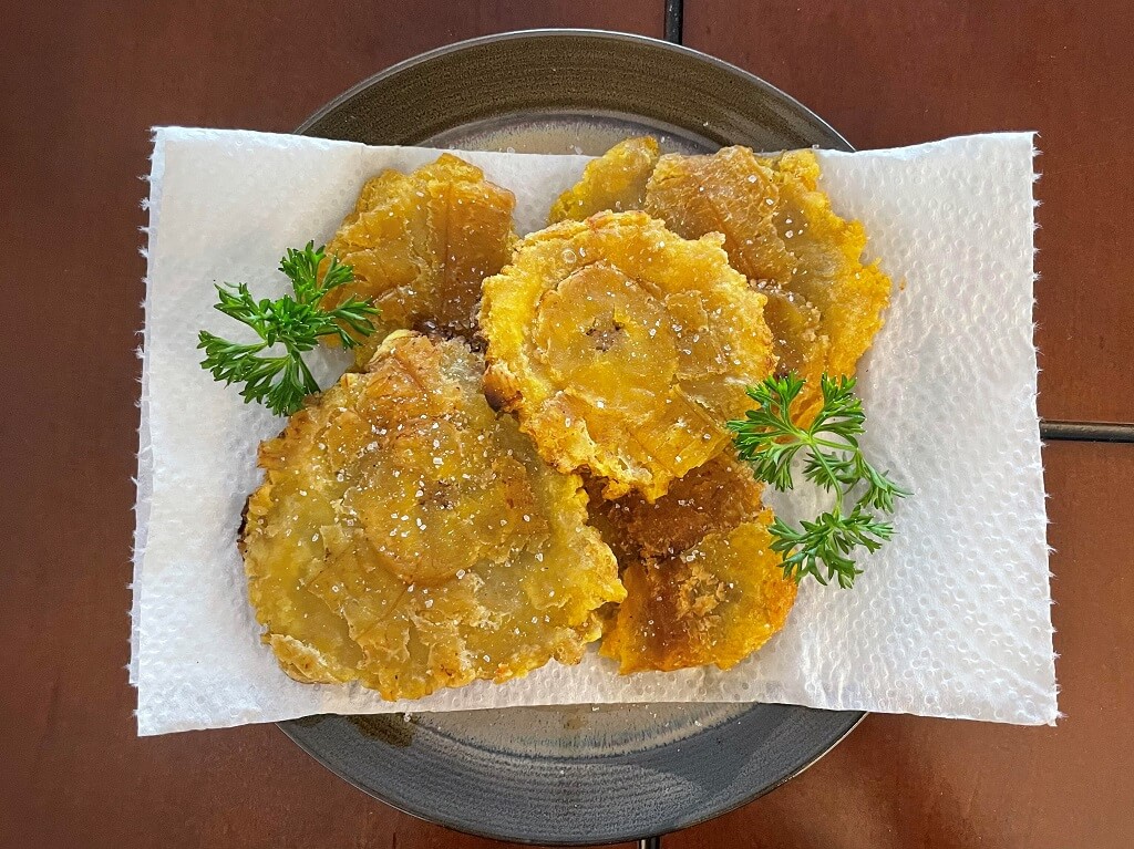 a plate full of fried plantains