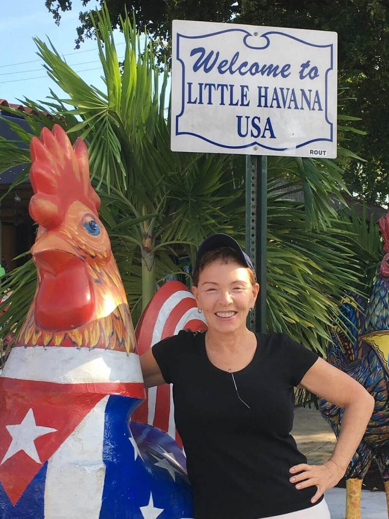 Talek Nantes and a rooster statue in Little Havana.