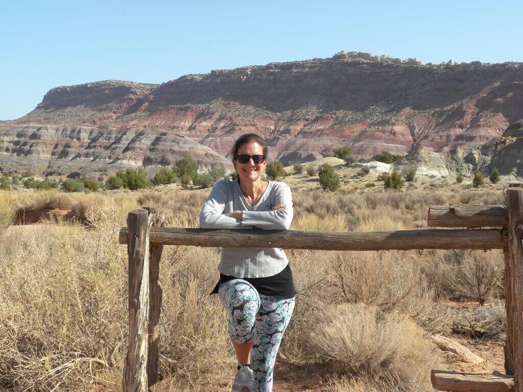 Woman with mountains in background