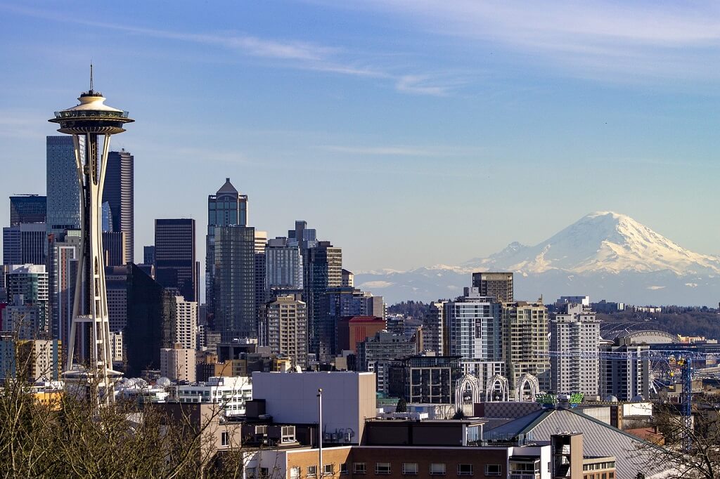 Seattle with the Space Needle and Mount Ranier in the distance seen on your 3-day itinerary for Seattle 