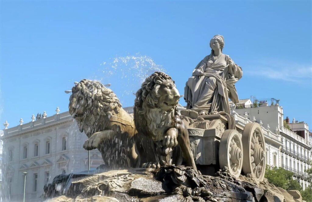 Elaborate fountains with woman and lion sculptures to see on your 2 days in Madrid.