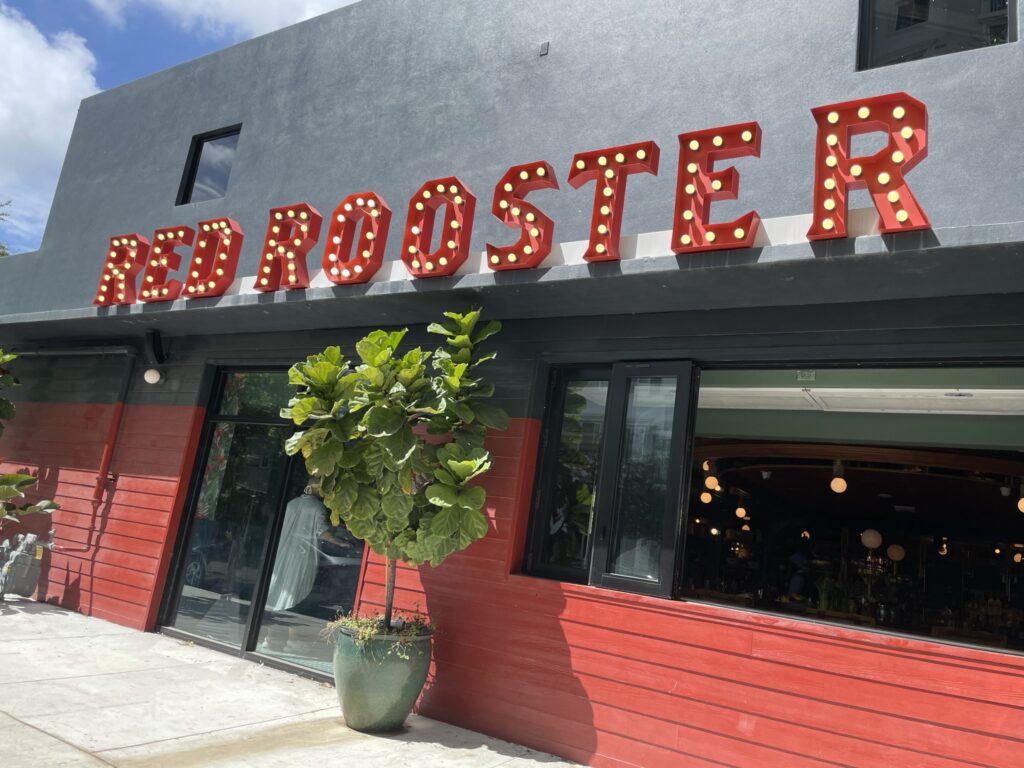 Sign for Red Rooster restaurant in Historic Overtown