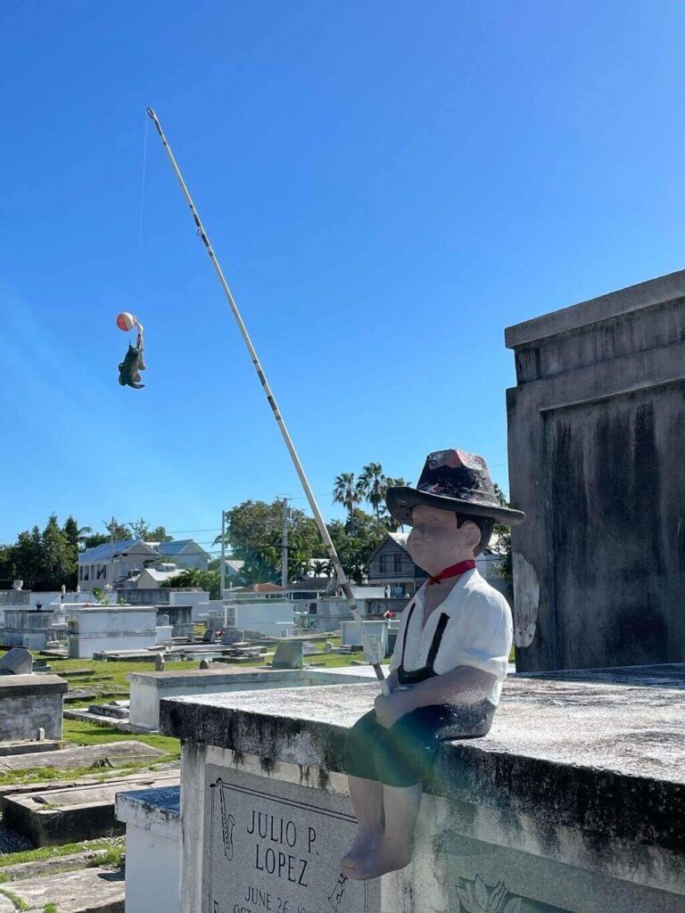 Boy with fishing pole in Key West Cemetery