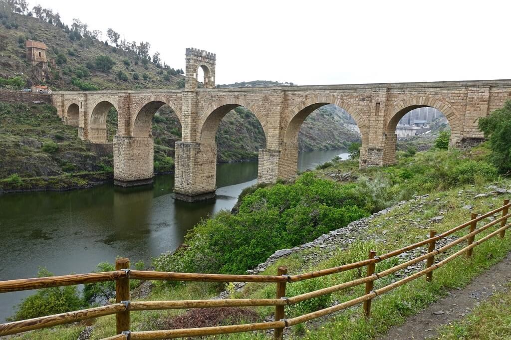 The Roman Bridge of Alcantara one of the sights on road trips in Spain
