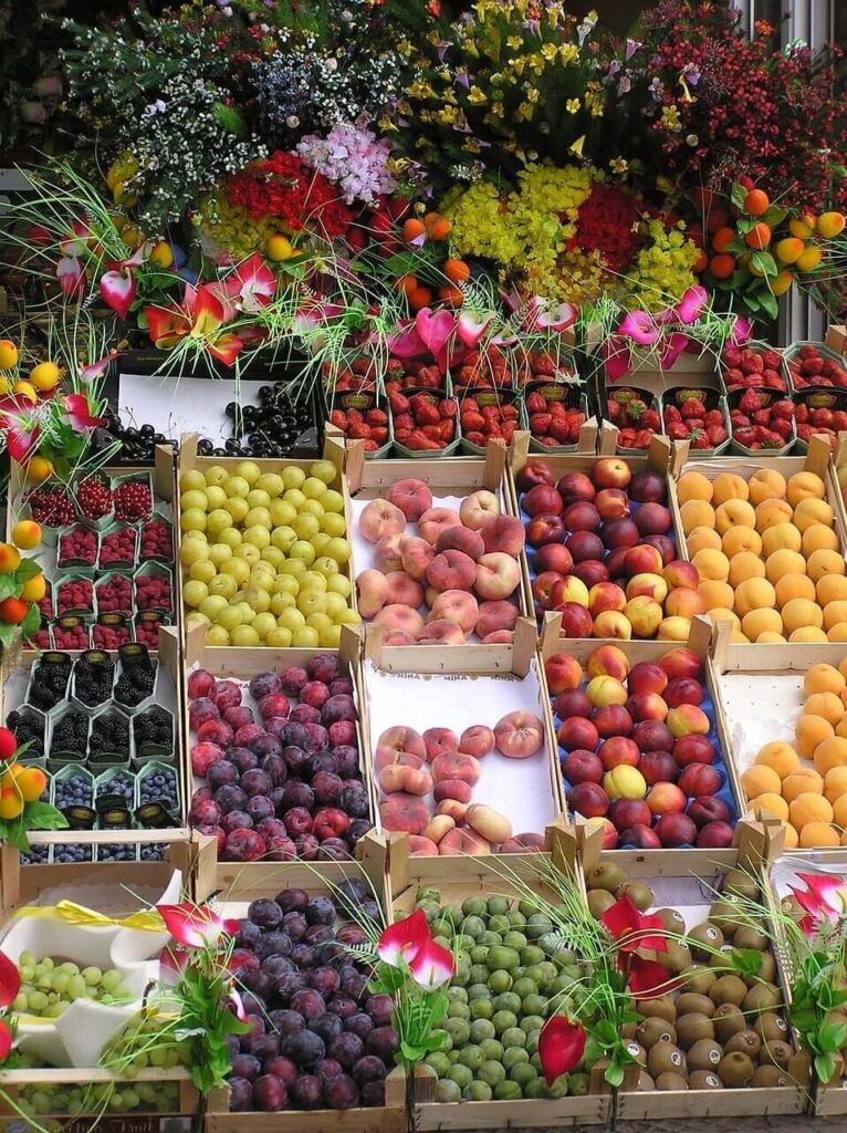 Fruit and flowers on Rue Montorgueil a Paris off the beaten path street