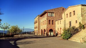 A brown hostel with blue sky background