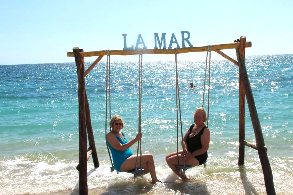 Two wanderers on a Cuban Beach