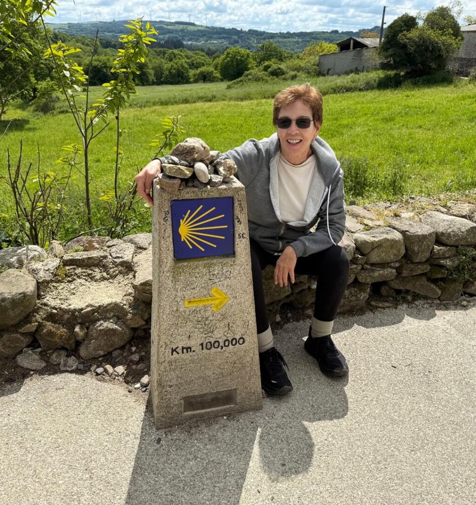 Talek at the 100 km marker found on the Camino de Santiago.