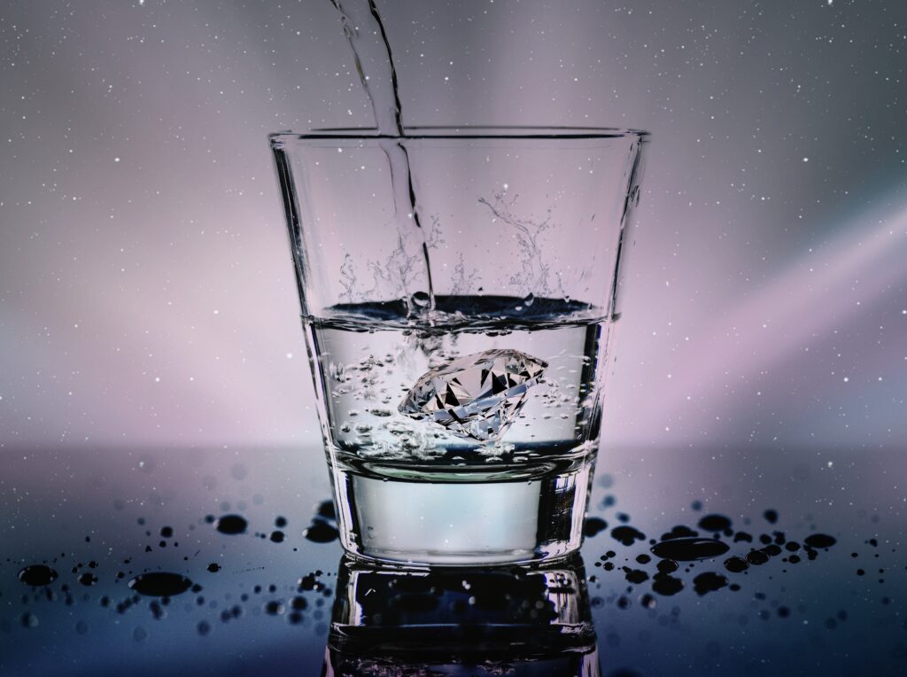 a glass of water. Stay hydrated to beat jet lag and sleep better while traveling