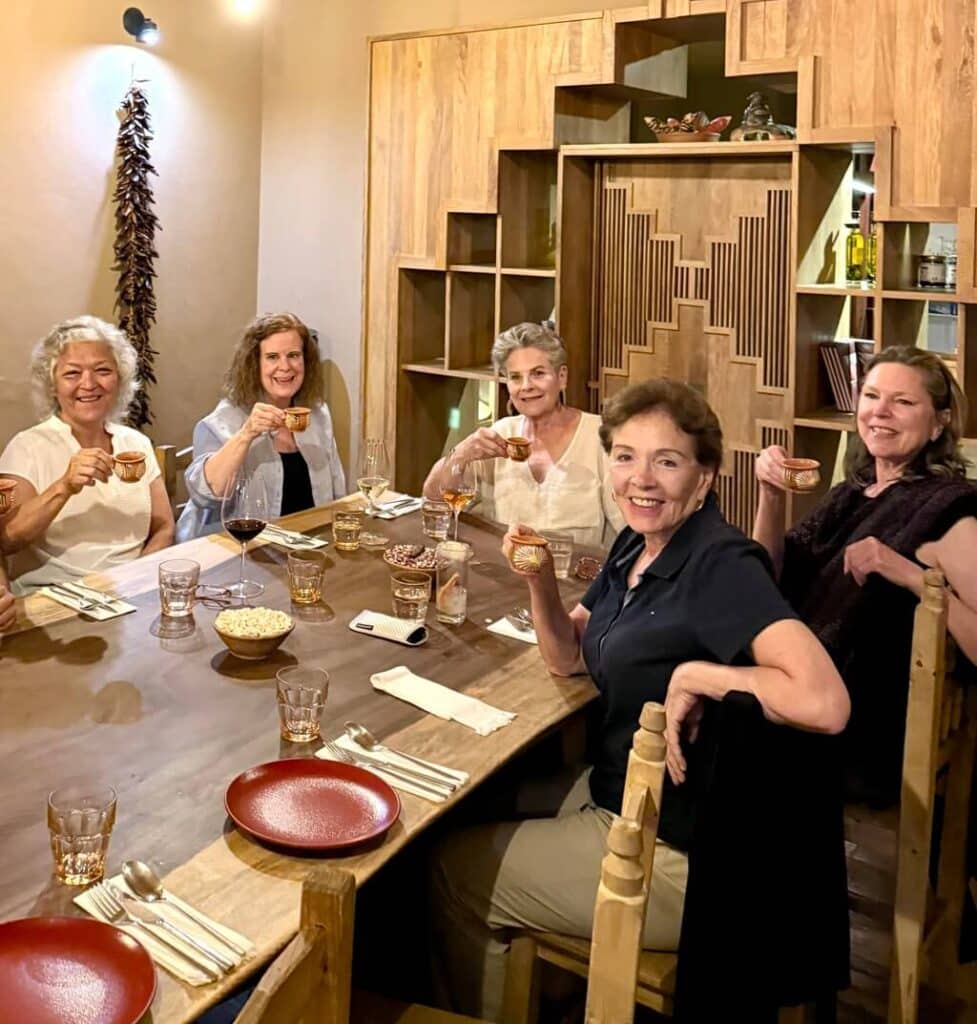 Women over 50 enjoying a meal in Oaxaca