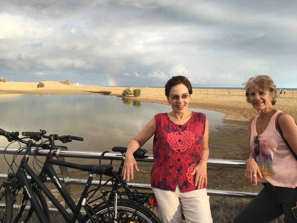 Two women biking in Spain